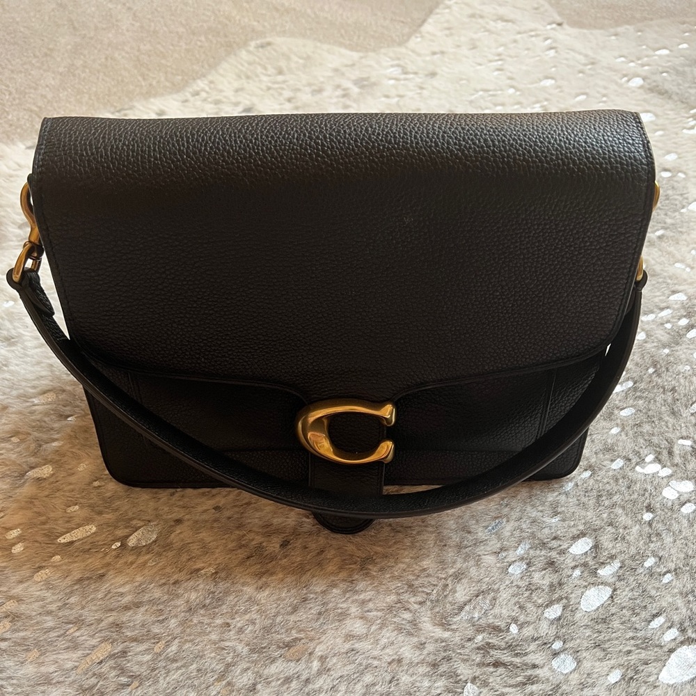 Coach saddle bag in black.